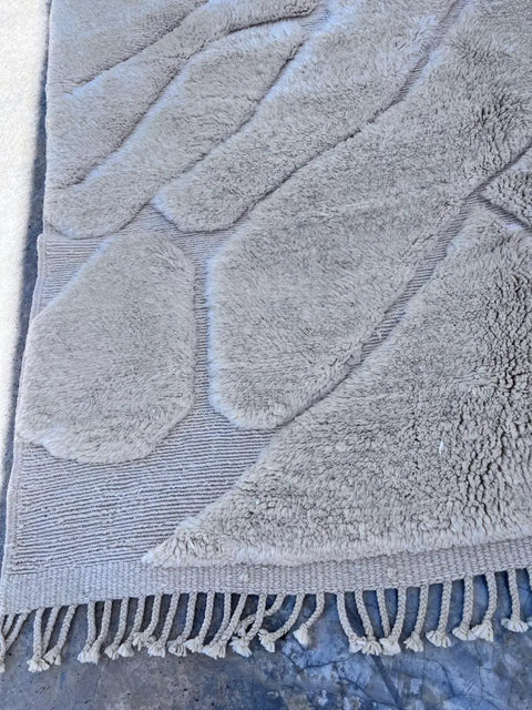Pourquoi un tapis fait main est cher : laine, prix et savoir-faire